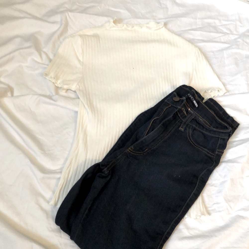 Off white shirt, blue jeans